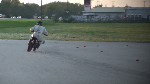 Backin it in Turn One motard1